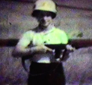 At the Gaza strip (then part of Egypt), 1963. Can you believe the Israeli border guard let me wear his helmet and hold his rifle? Digitized from 8mm video.