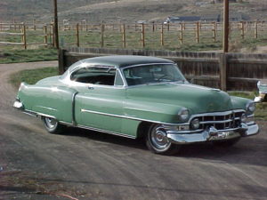 52 two tone green Cadillac